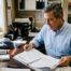 Texas restaurant owner reviewing insurance paperwork