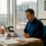 Insurance agent reviewing policy workflow at desk
