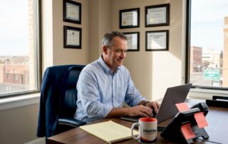 Agent working in sunlit Lubbock office